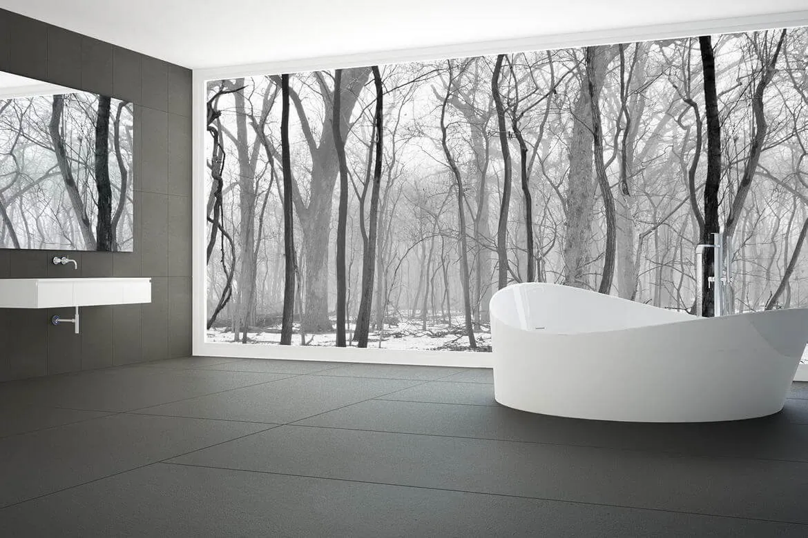 Bathroom with forest mural and freestanding tub